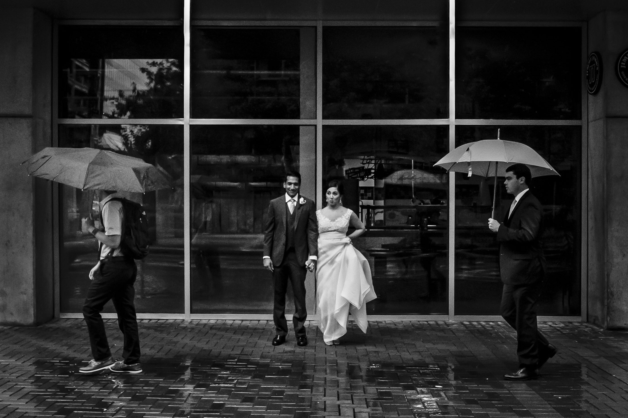 bride groom umbrella rainy wedding